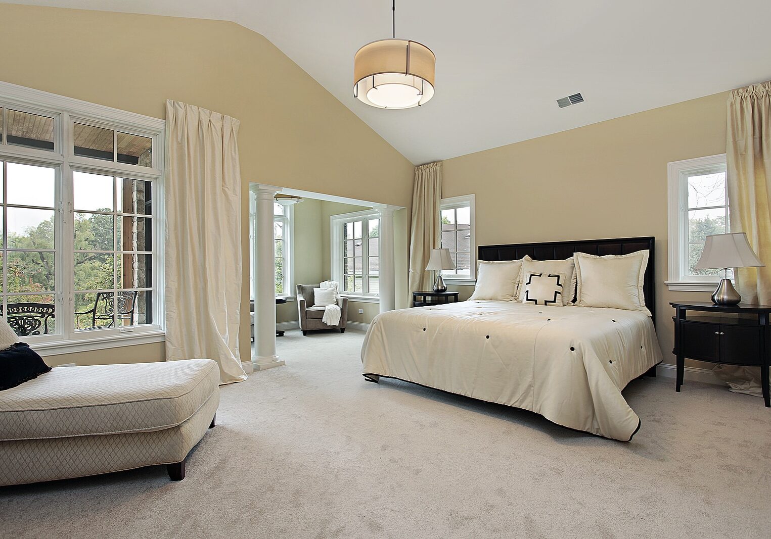 Master bedroom in luxury condominium with sitting room